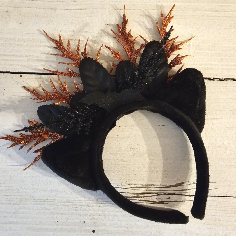 Hand decorated Halloween cat ear head band in black and orange